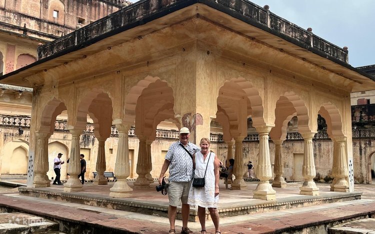 Guide and traveler at a local spice market